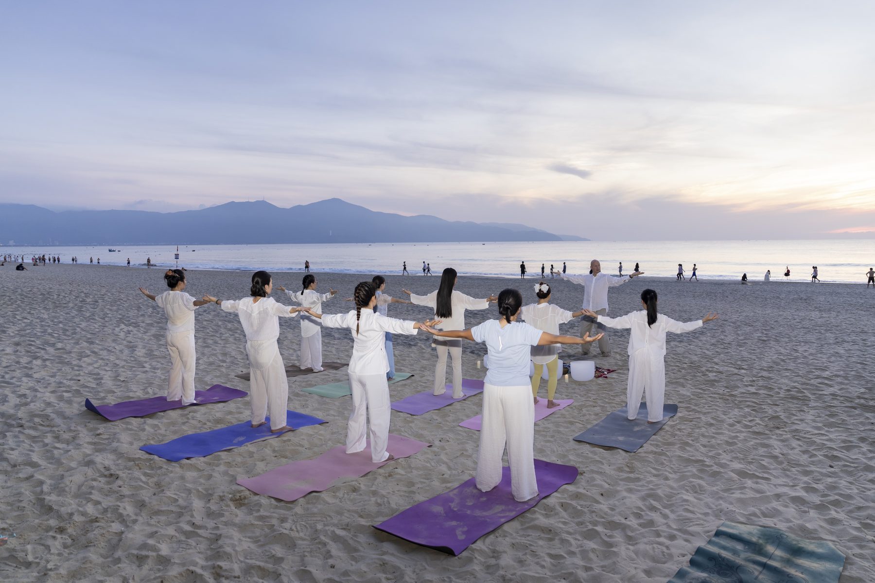 Seb guiding a Qigong group